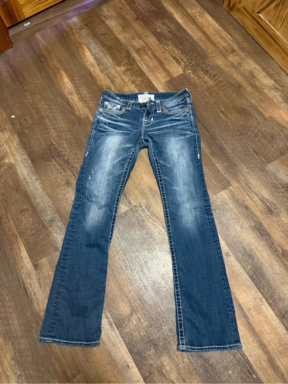 Big Star Women’s Distressed Flared Jeans in Mid Blue